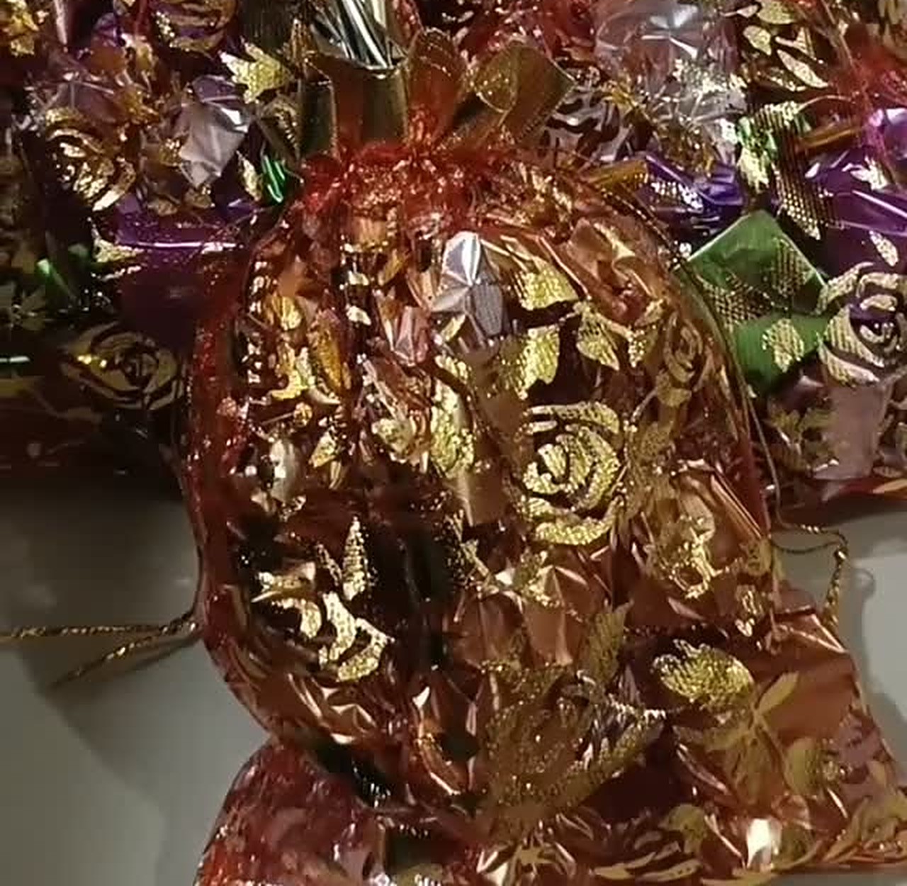 Choco Bites festive potli gift pouches in gold foil